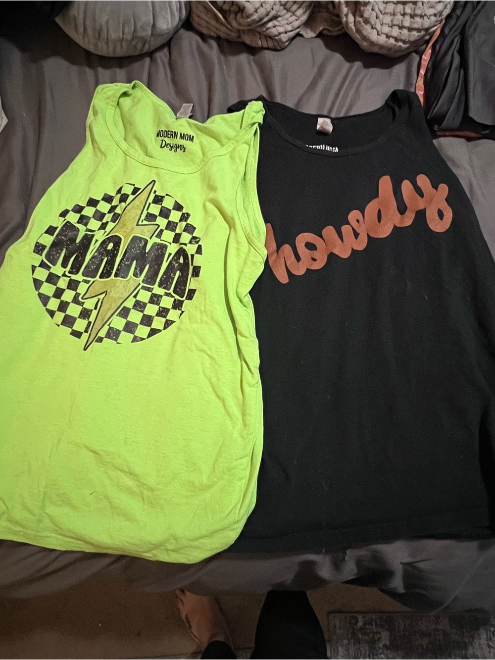 Two Graphic Tank Tops both fit like Large